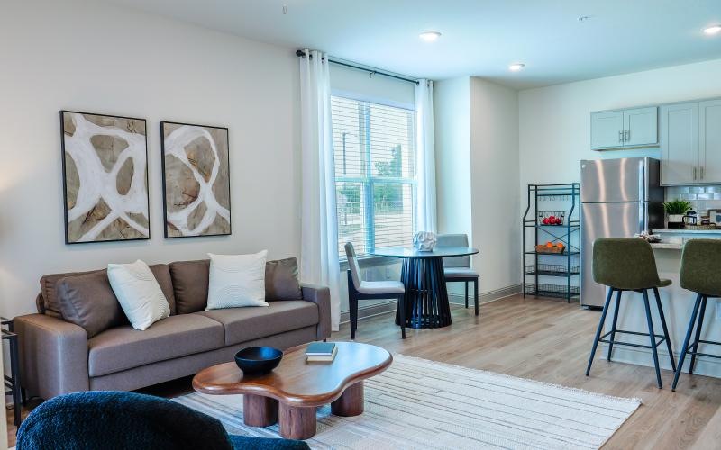 a living room with a couch and a table