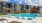 a swimming pool in front of a building