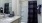 a bathroom with a sink and a shower curtain